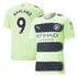 Erling Haaland Manchester City jersey in light green with black stripes and team logos by Jerseyteamsworld