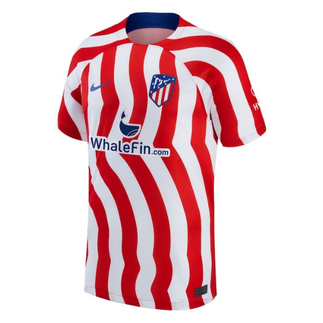 Atletico de Madrid home jersey 2022/23 with red and white wavy stripes and WhaleFin sponsor logo