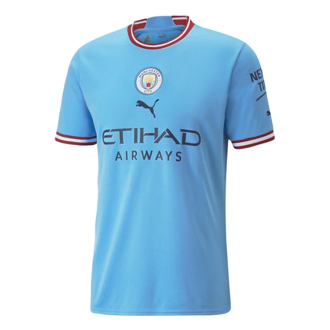 Phil Foden Manchester City 2023 Puma jersey in blue with Etihad Airways logo and club crest