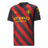 Manchester City 2022 23 away jersey with black and red diagonal stripes and yellow logos